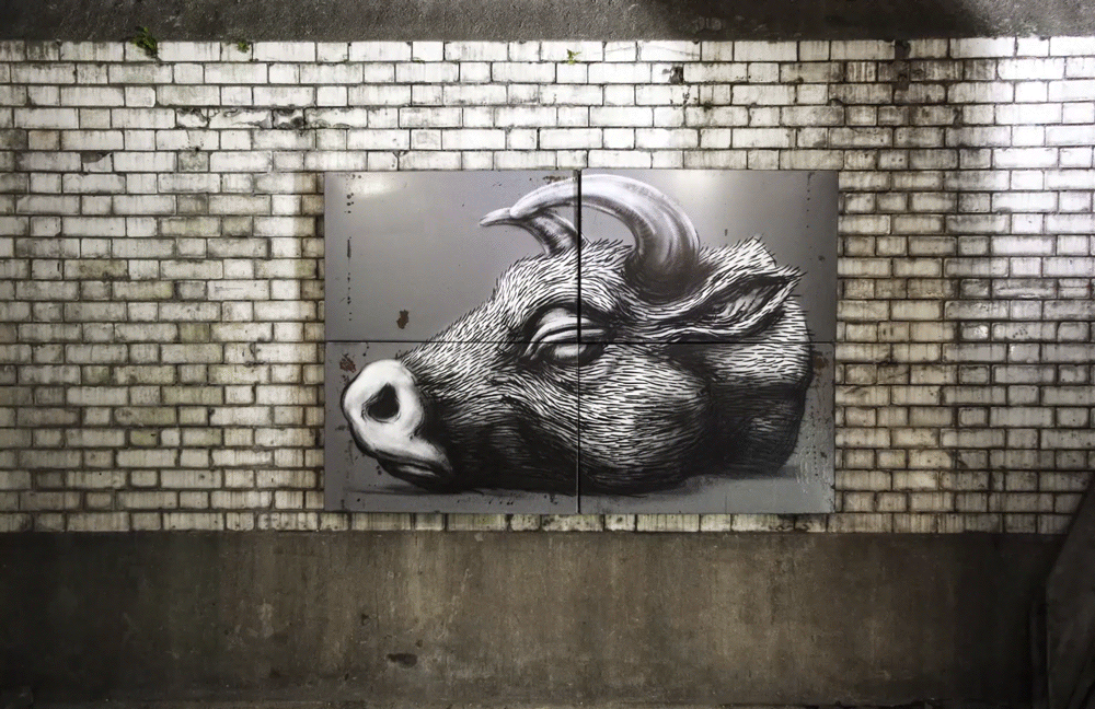 ROA street art graffiti animal bones bull gif
