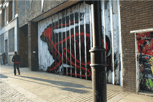 ROA street art graffiti animal bones rabbit